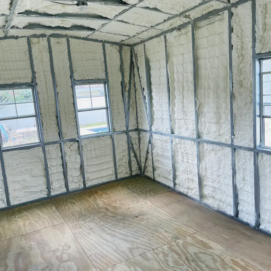 Closed-cell spray foam insulation applied to wall cavities in a residential project in Elizabeth